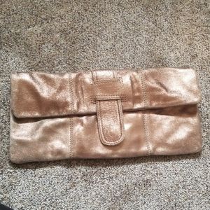 Rose gold leather clutch